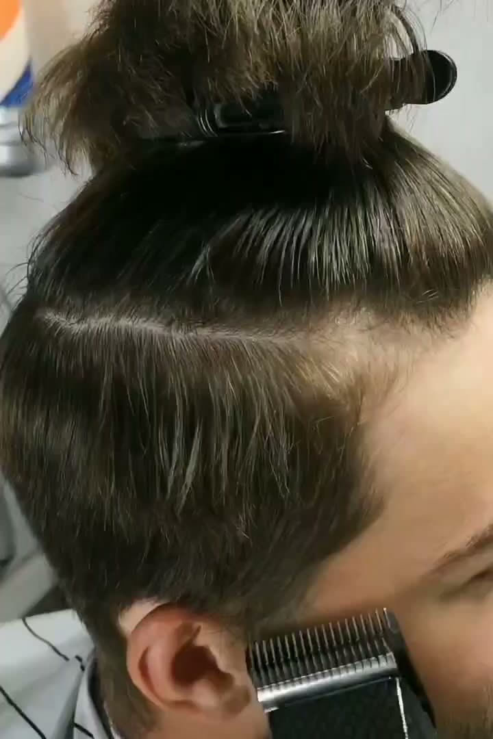 Before: long hair tied up in a bun, clippers just starting on the side